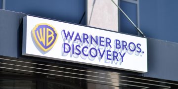 2R35B32 Warsaw, Poland. 21 May 2021. Sign Warner Bros. Discovery. Company signboard Warner Bros. Discovery